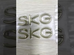 Custom Perak Emas TPU Transfer Panas 3D Label Logo Embossed untuk T-shirt