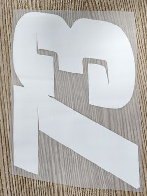 Custom Label Fashion DTF Sticker Film On PET Transfer Pengisaran Untuk T-shirt