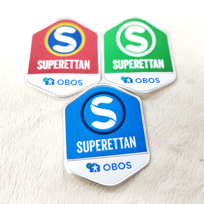 Custom TPU Heat Transfer Badge - Logo Superettan OBOS 3D Label Pakaian yang Diukir untuk Aksesoris Pakaian